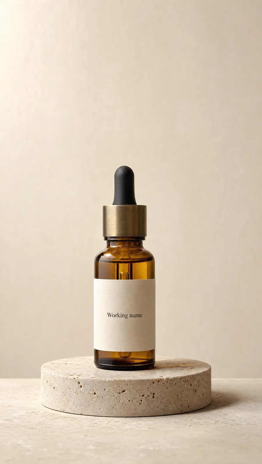 An amber glass dropper bottle on a travertine plinth